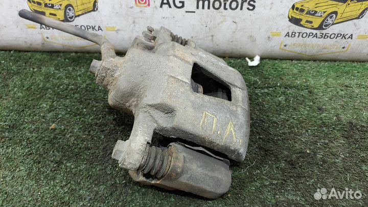 Супорт тормозной передний левый Шевроле Ланос