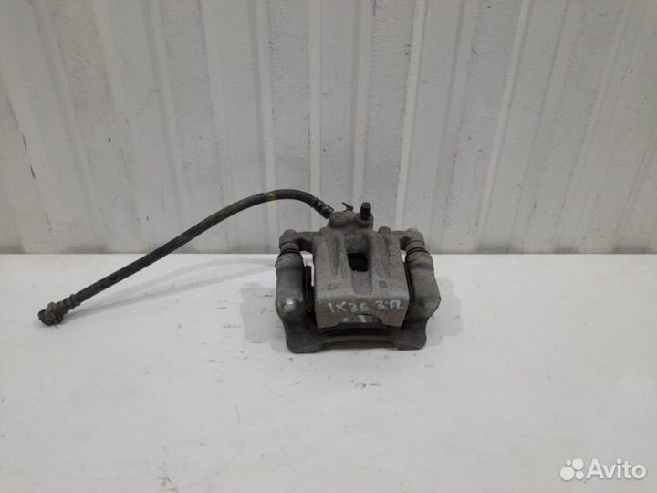 Суппорт тормозной задний правый Hyundai Ix35