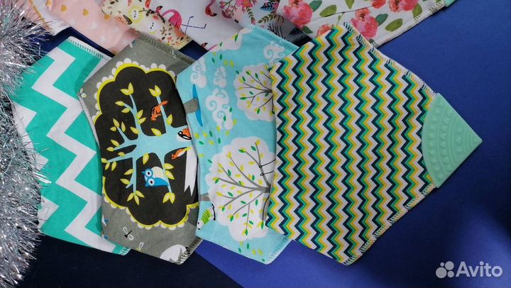 Слюнявчики с прорезывателем, новые