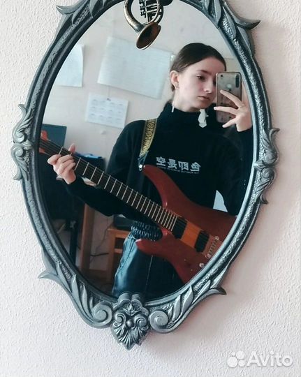 Репетитор по игре на гитаре