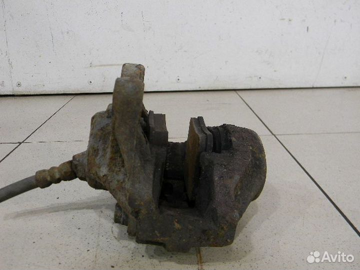 Суппорт задний левый