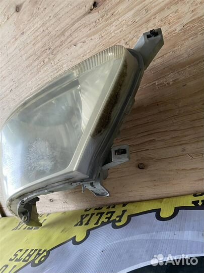 Фара левая Nissan Serena (pnc24) 1999-2005