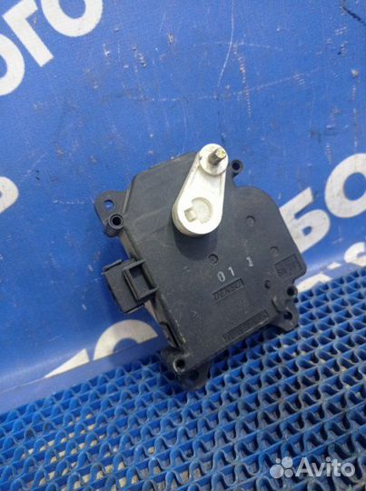 Моторчик заслонок отопителя Toyota Corolla Ce 130