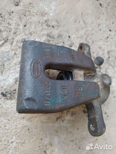 Суппорт задний левый Land Rover Freelander 2