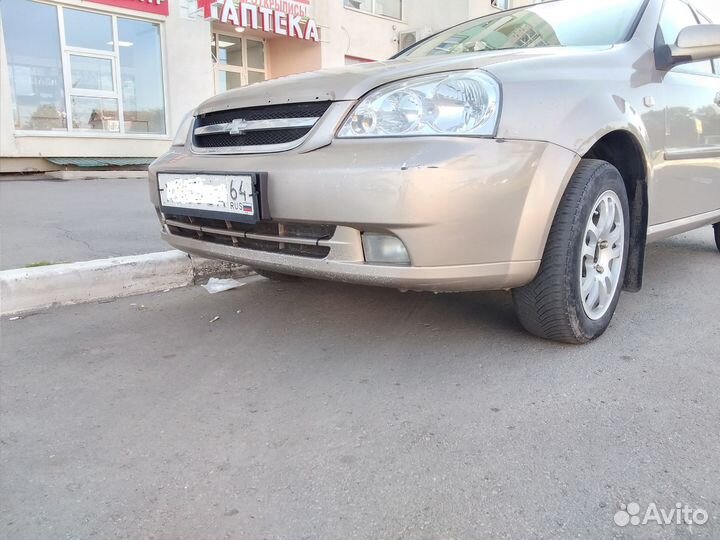 Бампер передний лачетти седан