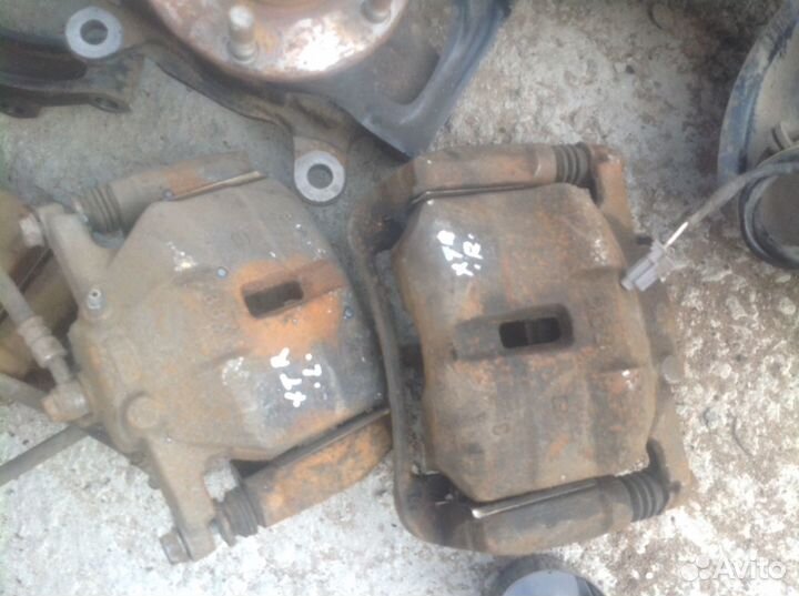 Суппорт тормозной передний Nissan x trail t31