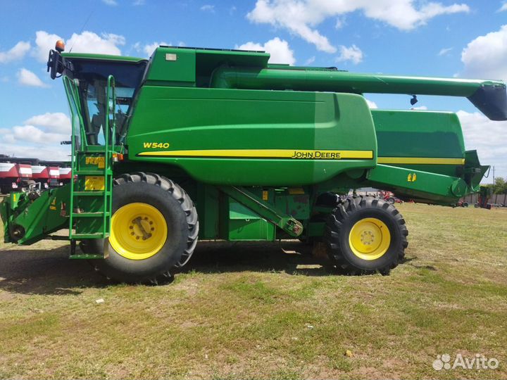 Комбайн John Deere W Series, 2011