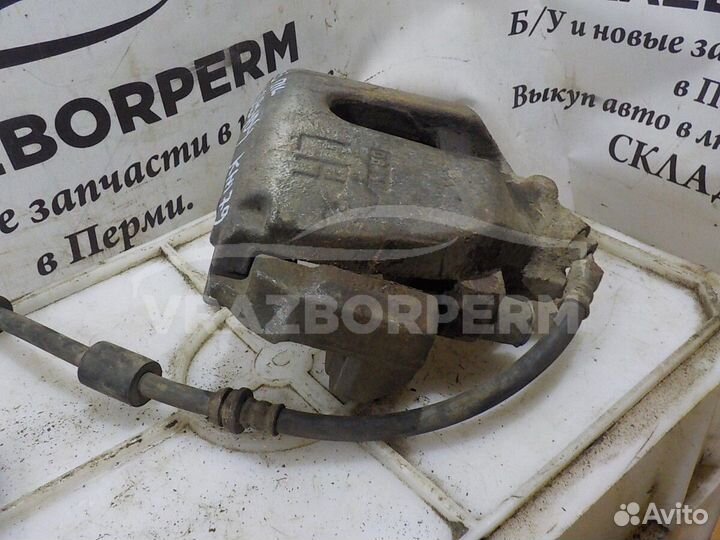 Суппорт тормозной передний левый Mazda 3