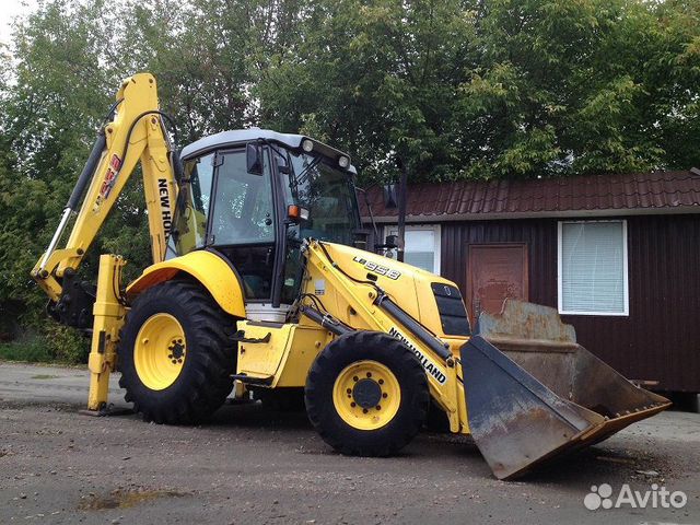 Планировка погрузчиком. Экскаватор-погрузчик Komatsu wb93r. Komatsu wb93r 2. Распределитель Komatsu wb93. Komatsu wb150-2.