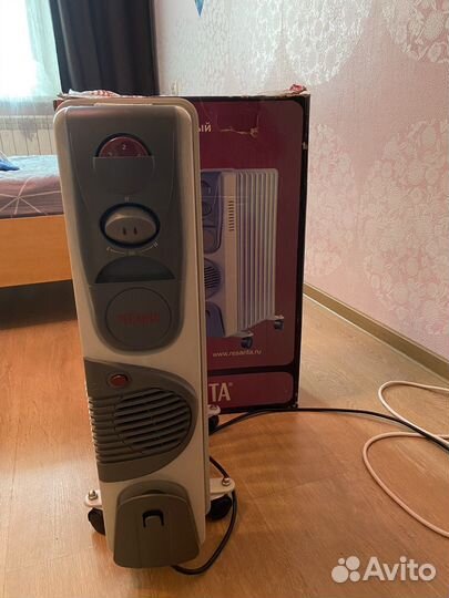 Масляный обогреватель