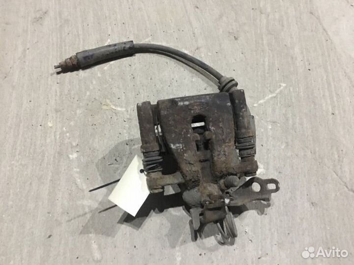 Суппорт тормозной задний левый Ford Kuga 1 2.5 I