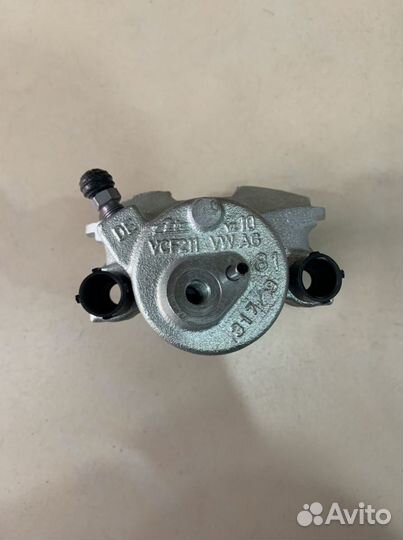 Суппорт тормозной перед лев Шкода Октавиа