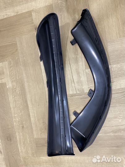 Накладки на передний бампер lancer 10 клыки)