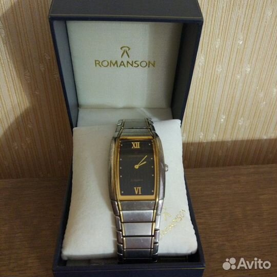 Часы Romanson