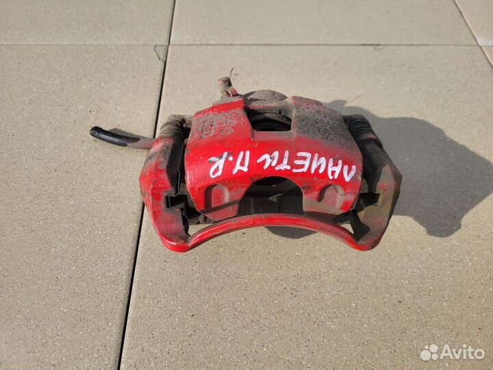 Тормозной суппорт передний правый Chevrolet Лачетт