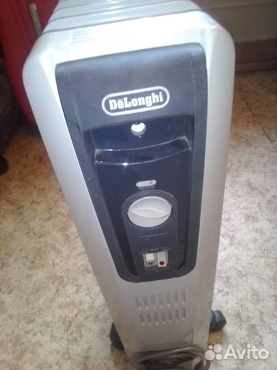 Масляный обогреватель DeLonghi