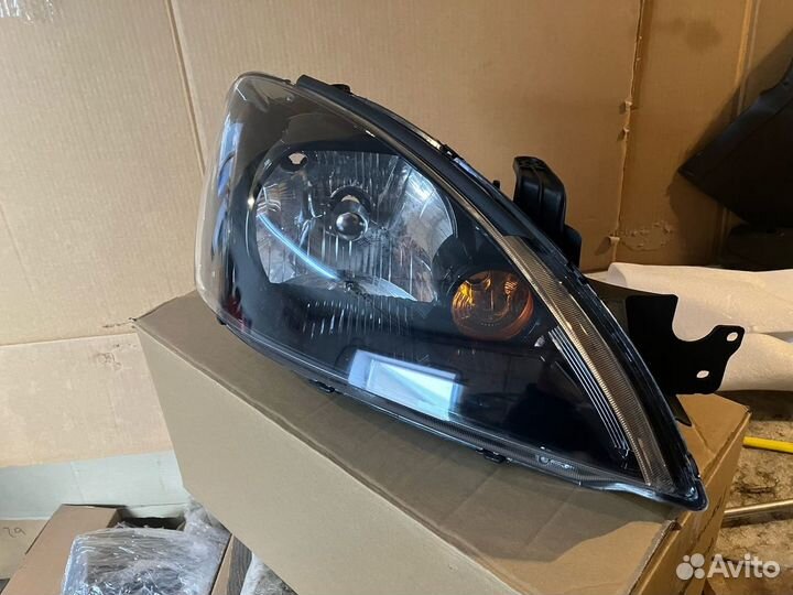 Фара черная MMC Lancer 9