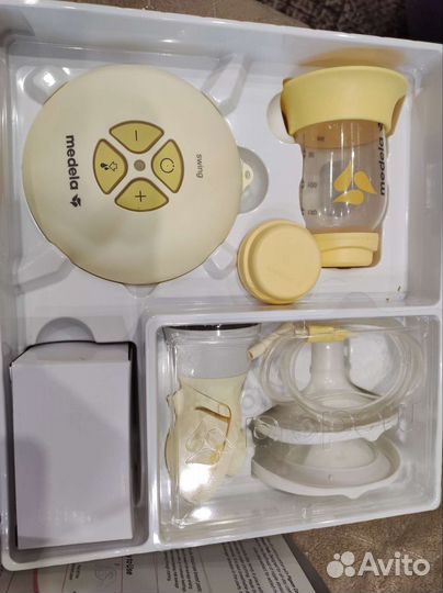Молокоотсос medela электрический