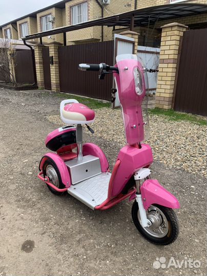 Электроскутер трицикл