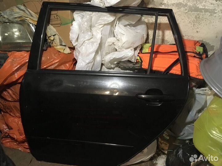 Дверь левая задняя Toyota Corolla Fielder