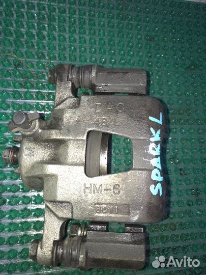 Суппорт тормозной передний левый Chevrolet Spark