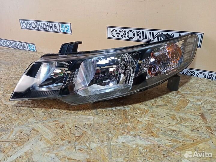 Фара левая Kia Cerato (09-12г) седан черная М/К