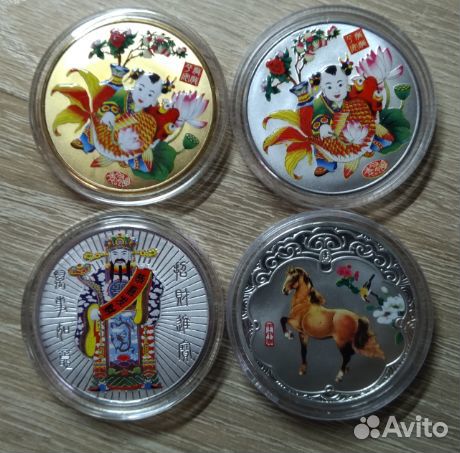 Китай. Декоративные монеты.Цена одной монеты