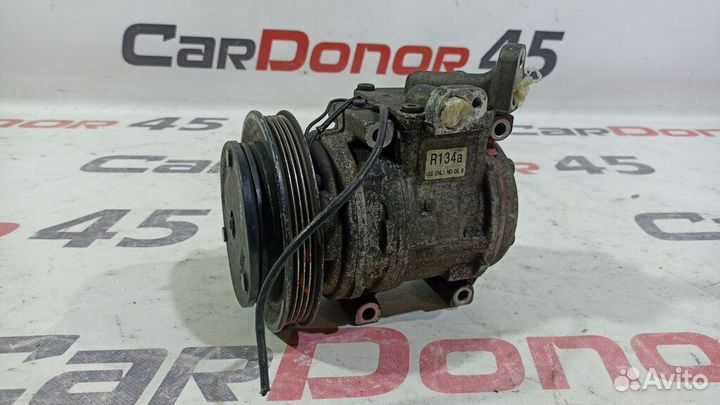 Компрессор кондиционера б/у для Kia Shuma (1204001