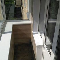 Остекление балкона с отделкой
