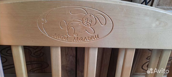 Детская кроватка с маятником