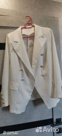 Пиджаки и жакеты женские 50
