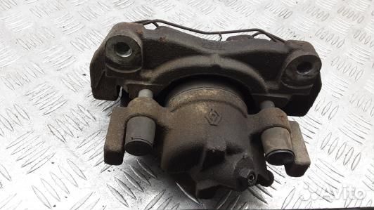 Суппорт тормозной передний левый renault laguna 3