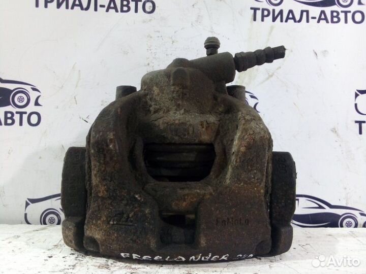 Суппорт тормозной Freelander 2 передний левый