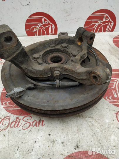 Кулак передний левый Nissan Qashqai+2 JJ10E HR16DE