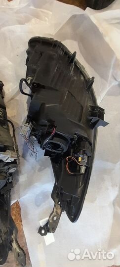 Передние фары на Mazda Demio