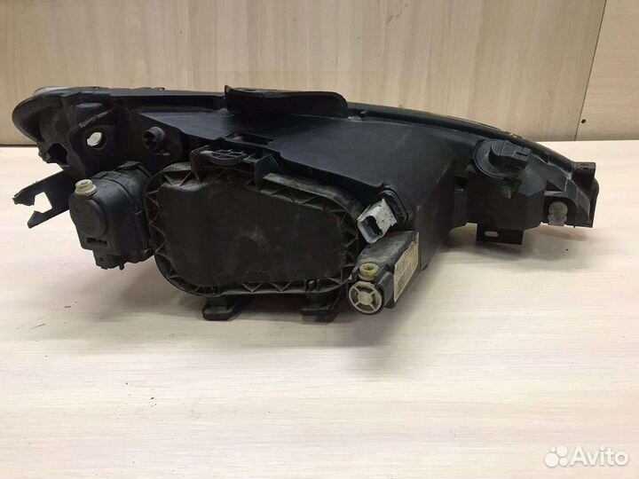 Фара левая Peugeot 206