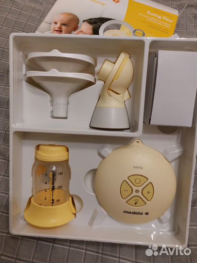 Молокоотсос medela swing flex электрический