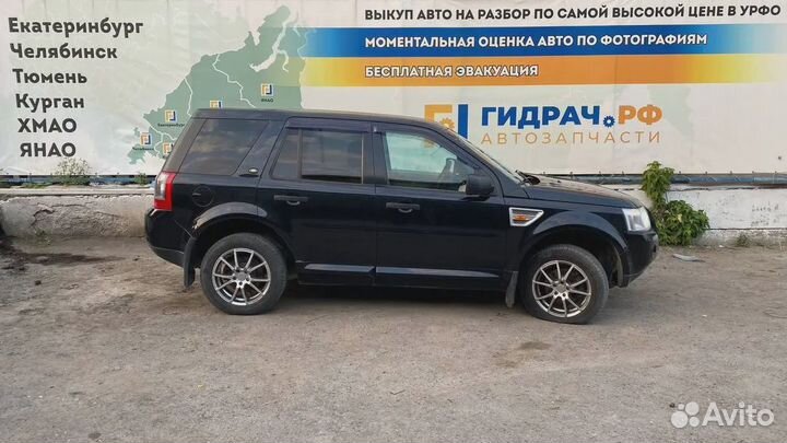 Стекло кузовное глухое левое Land Rover Freelander