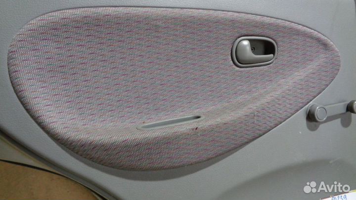 Обшивка двери задней левой Kia RIO 1 (DC)