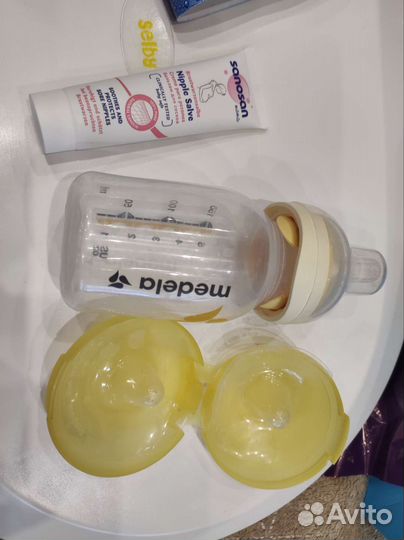 Молокоотсос medela электрический