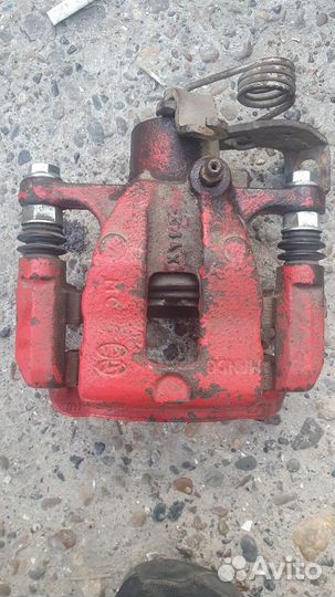 Суппорт задний правый kia rio 3