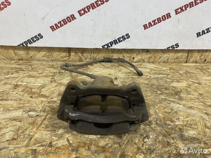 Суппорт тормозной передний левый Skoda Octavia A7