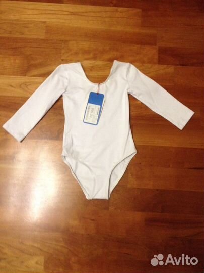 Новые гимнастичесие купальники 104 черный и белый