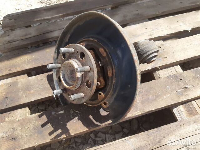 Кулак задний левый Kia Optima