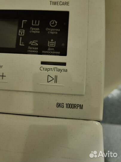 Стиральная машина с вертикальной загрузкой