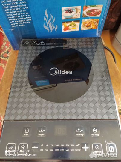 Индукционная плита Midea настольная
