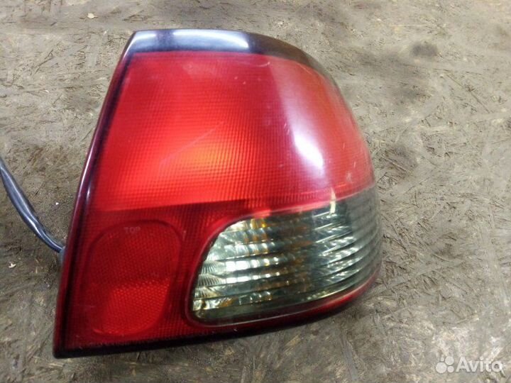 Фонарь задний задний правый Kia Avella седан 1.5