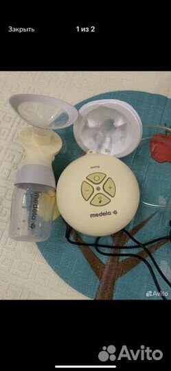 Молокоотсос электрический почти новый