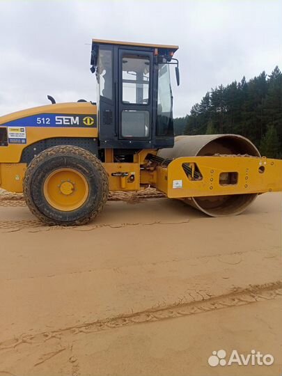 Машинист грунтового катка