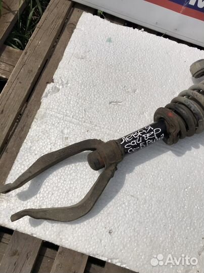 Передняя левая стойка в сборе Волга Сайбер